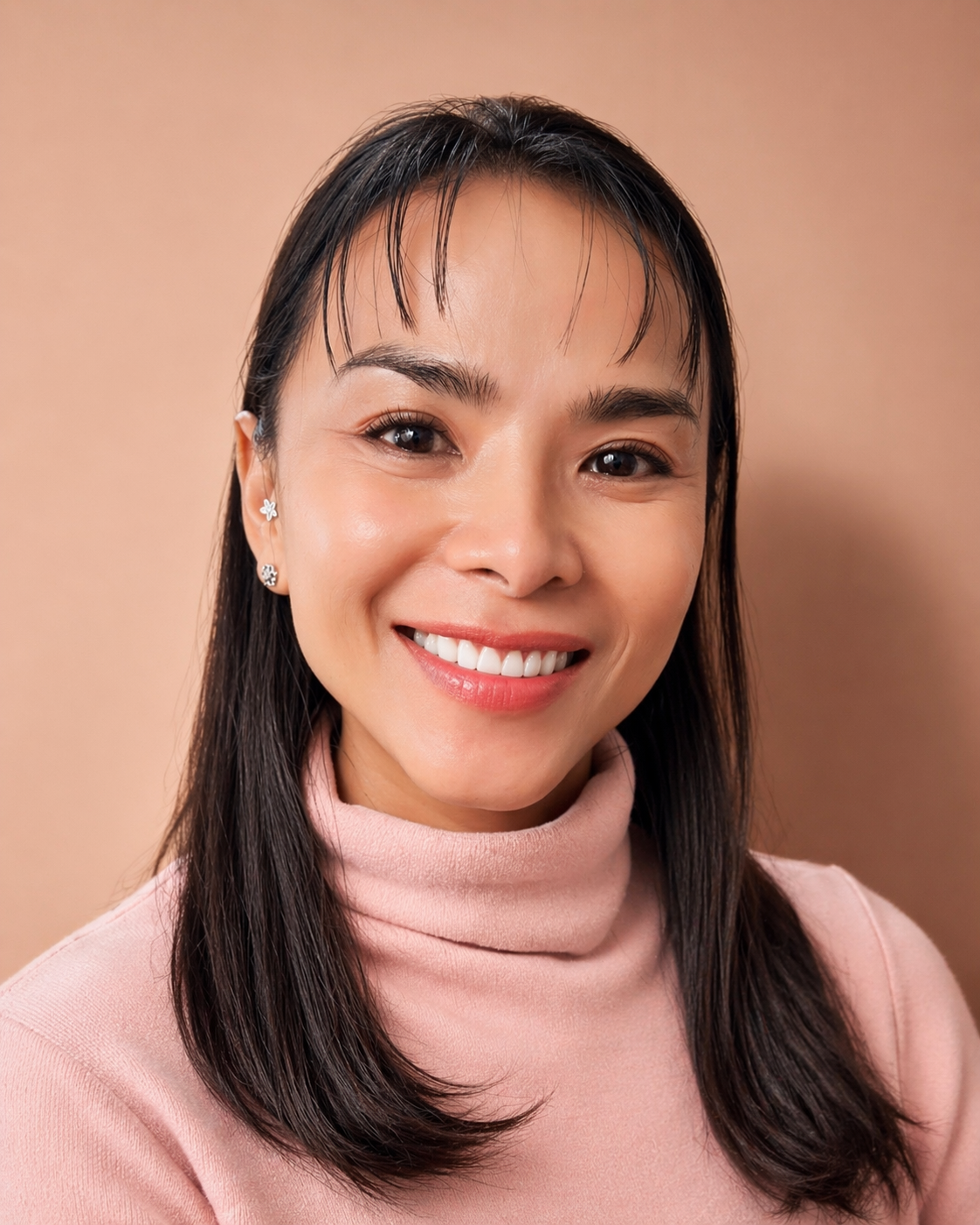 Dr. Kannatha Blazosky, Ph.D., Licensed Massage Therapist and Founder of Tiny Lotus Health and Wellness